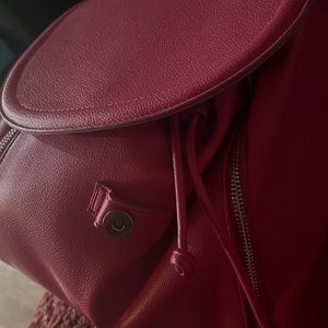 Pink handbag could also be a backpack really nice